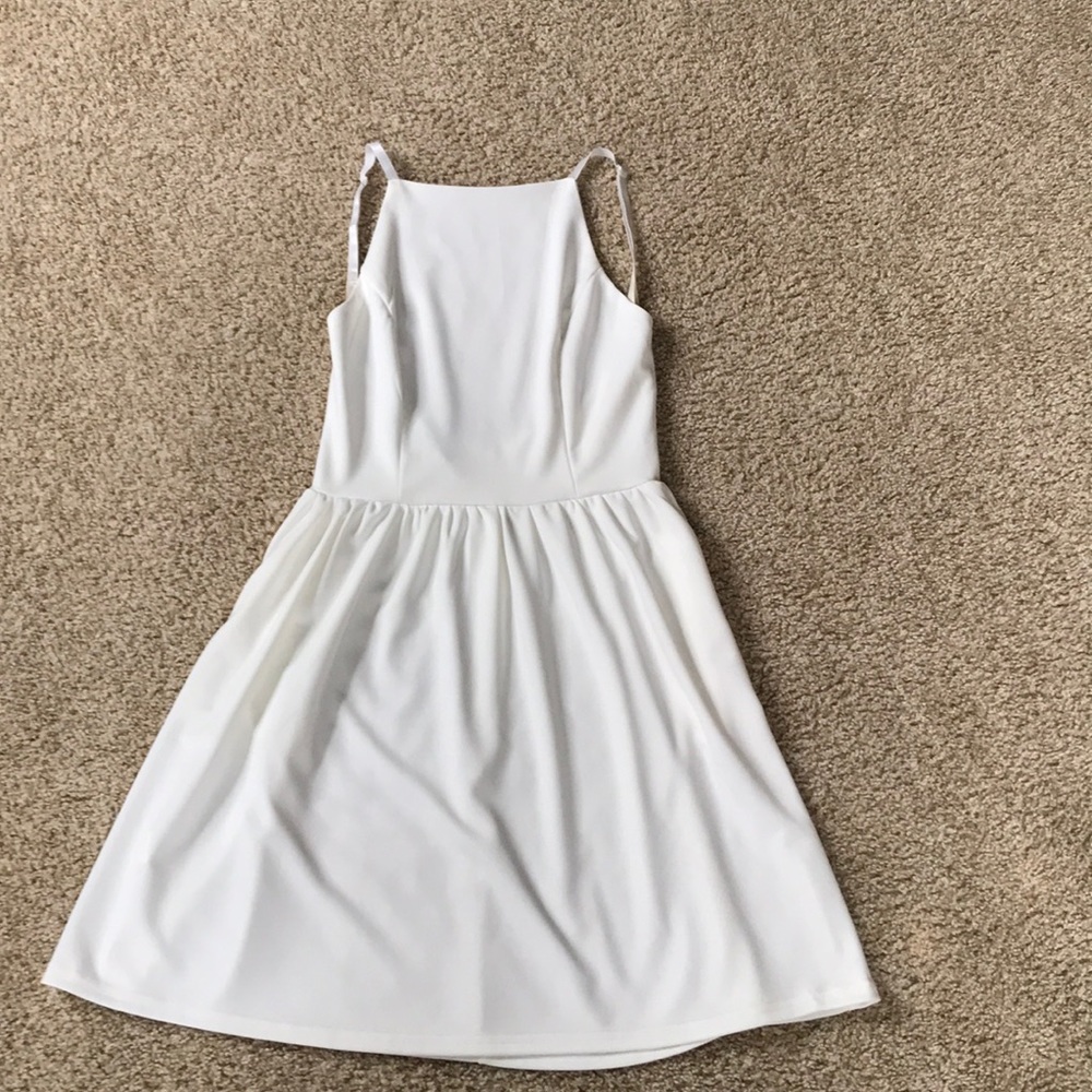Fancying Women’s White Open-Back Mini Dress